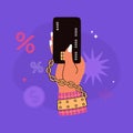Female hand chained and holding a credit card. Financial debt and money dependence concept